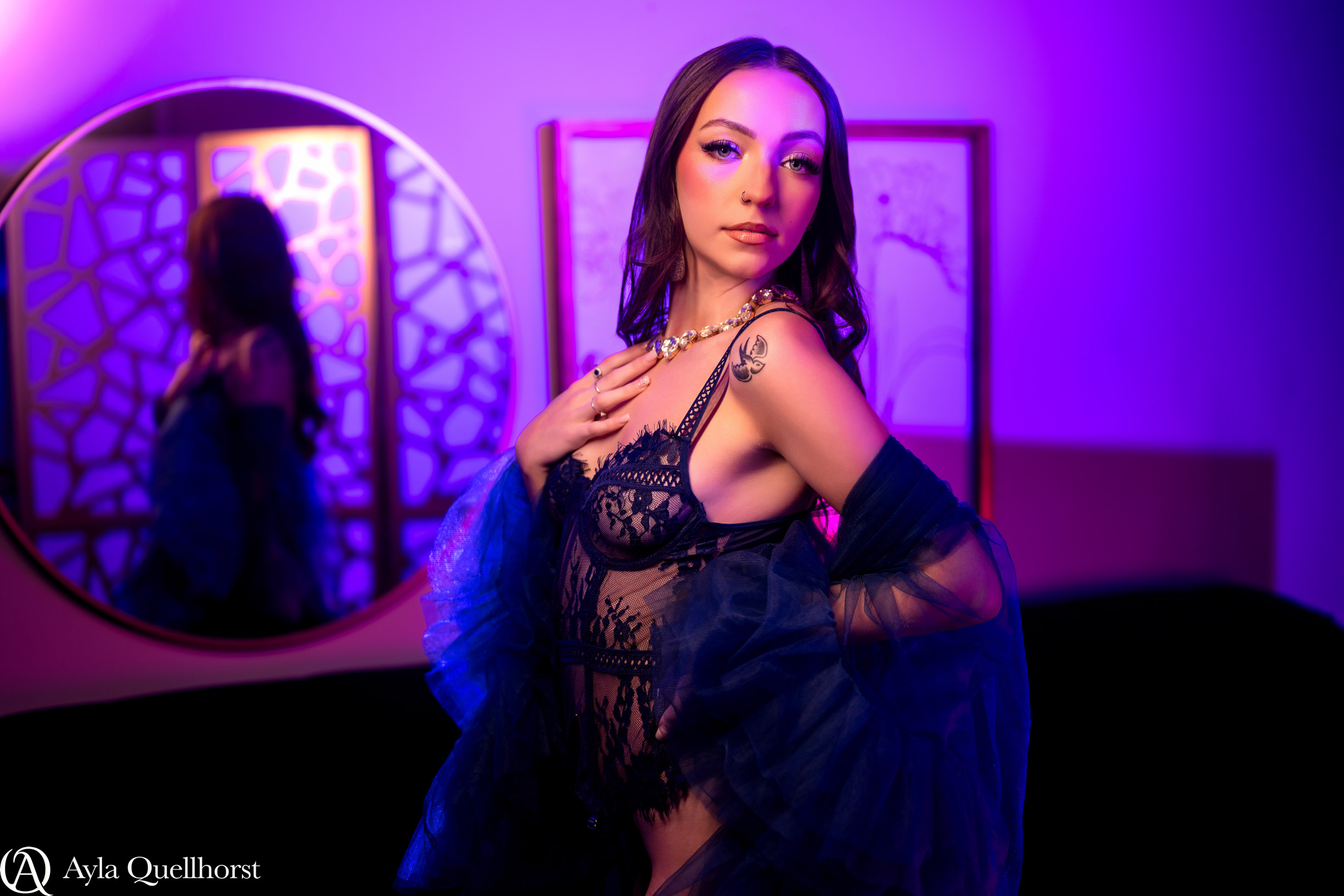 Woman posing during a boudoir session in a Tacoma, WA photography studio boudoir sessions in Tacoma