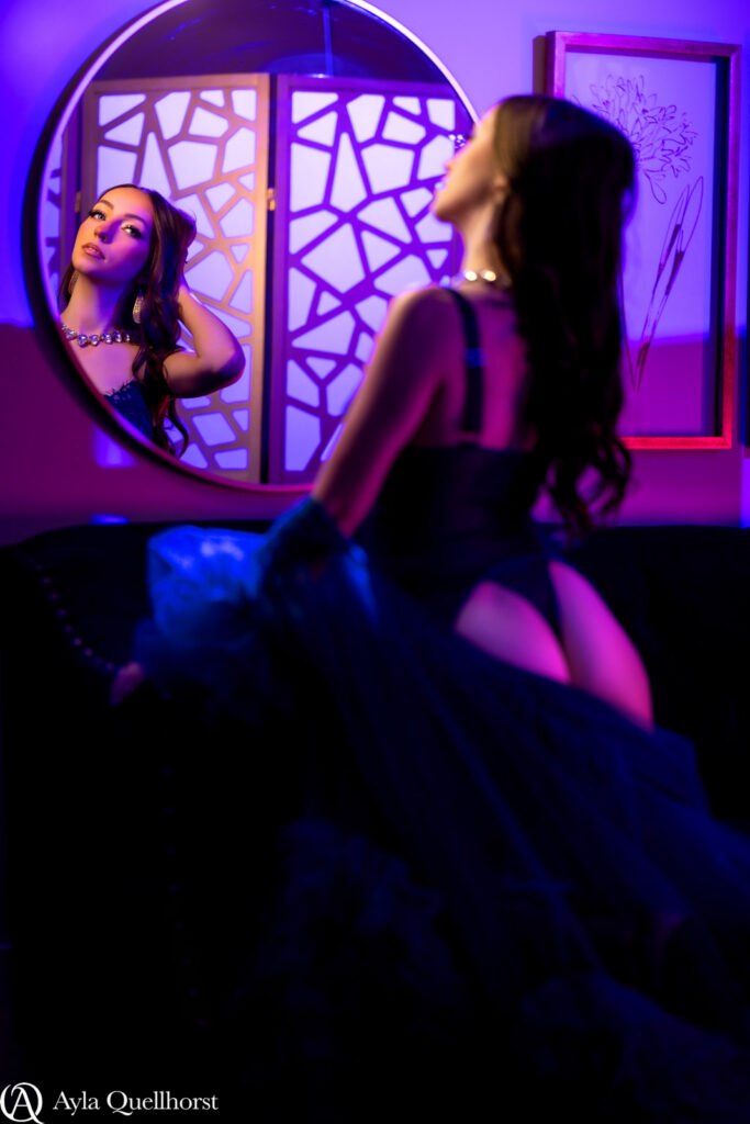 Woman posing during a boudoir session in a Tacoma, WA photography studio boudoir sessions in Tacoma