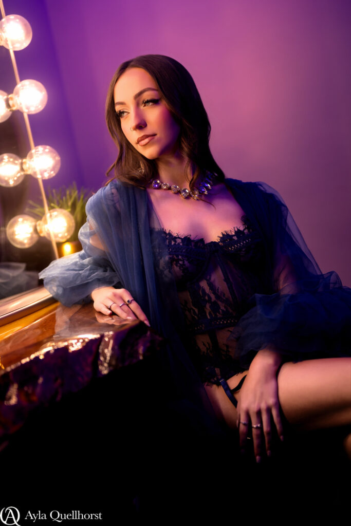 Woman posing during a boudoir session in a Tacoma, WA photography studio boudoir sessions in Tacoma