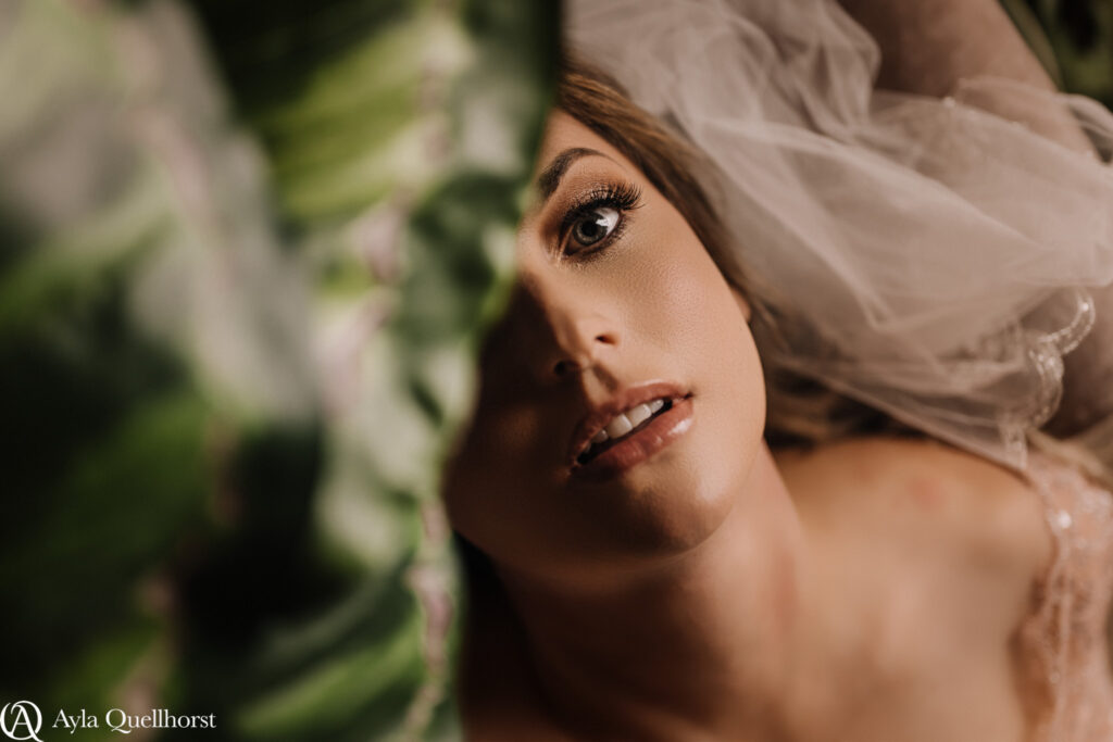 Close-up of bride’s eyes during boudoir photo session